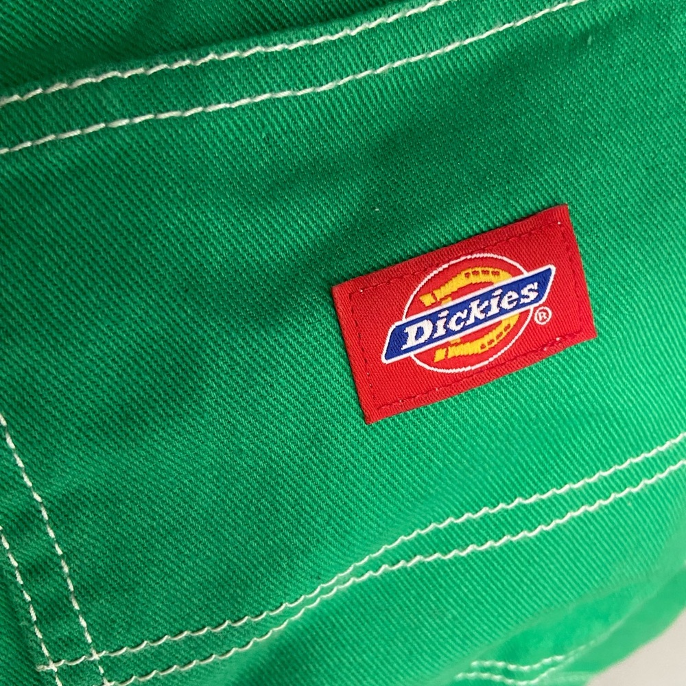 Green Dickies pants with white stitching, practically new, in superb condition